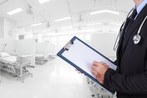 ASC man writing on clipboard