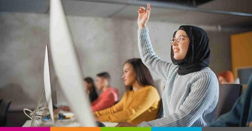 woman raising her hand 